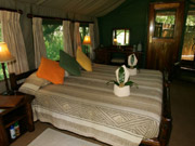 The comfortable interior of a tent at Selinda Camp in the Selinda Reserve, Linyanti, Botswana.