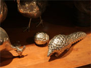 Sculpture by Zimbabwean silversmith Patrick Mavros is featured in the shop at Singita, Sabi Sands, South Africa.