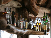 The well-stocked bar at Mombo Camp in the Okavango Delta, Botswana provides many options for quenching your thirst.
