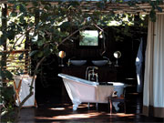 An old-fashioned Victorian slipper bath makes a decadent touch in a superior tent at Chiawa Camp, Lower Zambezi, Zambia
