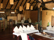 The comfortable lounge and bar of Luangwa River Lodge in South Luangwa National Park, Zambia.
