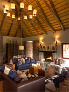 The spacious living room at Phinda Zuka Lodge, Phinda Reserve, South Africa offers guests all the comforts of home.